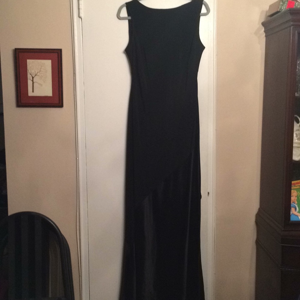 Black crepe/satin classic gown.  Draped back.